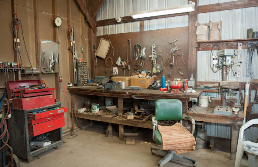 A new garage isn't just for storing your vehicle. It can offer useful storage, establish a functional working space, boost your home's worth, and enhance the aesthetic appeal of your home. But, to obtain these benefits, careful planning must be done from the outset. When rushing to build a project without taking into account future needs, building requirements, or the quality of the materials, unnecessary expenses and frustration can occur. At the planning stage, whether you're building a detached or attached garage, there are some important points you should remember to avoid expensive pitfalls and construct a garage that will benefit your family for years to come. Building Without a Long-Term Plan A common mistake homeowners make during garage construction is to only consider what they need that day or hour, rather than the long term. A two-car garage might be enough now, but it may not be enough later on when lifestyle changes might necessitate more storage space, workspace, or room for larger vehicles. Prior to construction, ask yourself the following questions: Do you require room for lawn tools or equipment? Are you thinking of buying a bigger car? Would the garage be a good example for a workshop/hobby room? Future planning requirements can be a lot cheaper to accommodate than if they are planned later. Choosing the Wrong Size The functional and convenient aspects of garages are determined by the dimensions. If a building is just big enough to fit the vehicles, there may not be much space for storage or moving around in. When designing your garage, consider: Vehicle size Door clearance Storage shelving Workbenches Walking space Overlooking Local Building Requirements Each municipality has building ordinances that include setback, permits, structural standards, and zoning requirements. Starting a construction project without proper knowledge of these rules can lead to project delays or extra costs. Hiring professional builders and checking construction permits in advance can help ensure that the project is completed on time and in compliance with the necessary regulations. Using Low-Quality Materials to Save Money Avoiding the investment in high-quality materials by opting for lesser quality options can result in increased maintenance costs in the long run. Sometimes it makes more sense to invest in long-lasting roofing, framing, siding, doors, and floor systems. A good material will resist the weather, moisture, and wear and tear and is good at protecting the building and the contents inside. Ignoring Proper Drainage and Site Preparation A solid base starts well before the concrete is poured. Standing water, damage to foundations, moisture issues, and premature deterioration are all potential problems caused by poor drainage. These prevent future structural problems in the garage and keep costs down. Forgetting About Lighting, Electrical Needs, and Ventilation Many homeowners may think about the structure but not about how they use the area on a daily basis. Consider including: Adequate interior and exterior lighting Convenient electrical outlets Charging options for power tools or electric vehicles Proper ventilation Future heating or cooling requirements